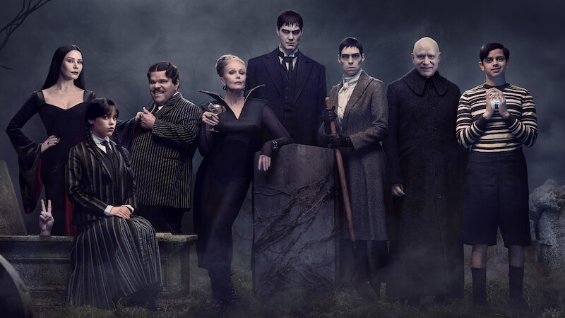 The Addams Family poses for a family portrait in 'Wednesday' Season 2