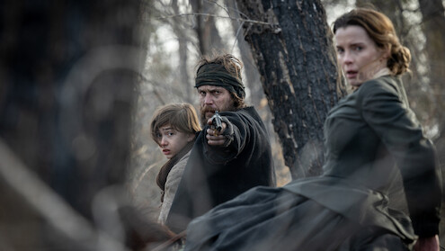 Taylor Kitsch and Betty Gilpin in 'American Primeval'.