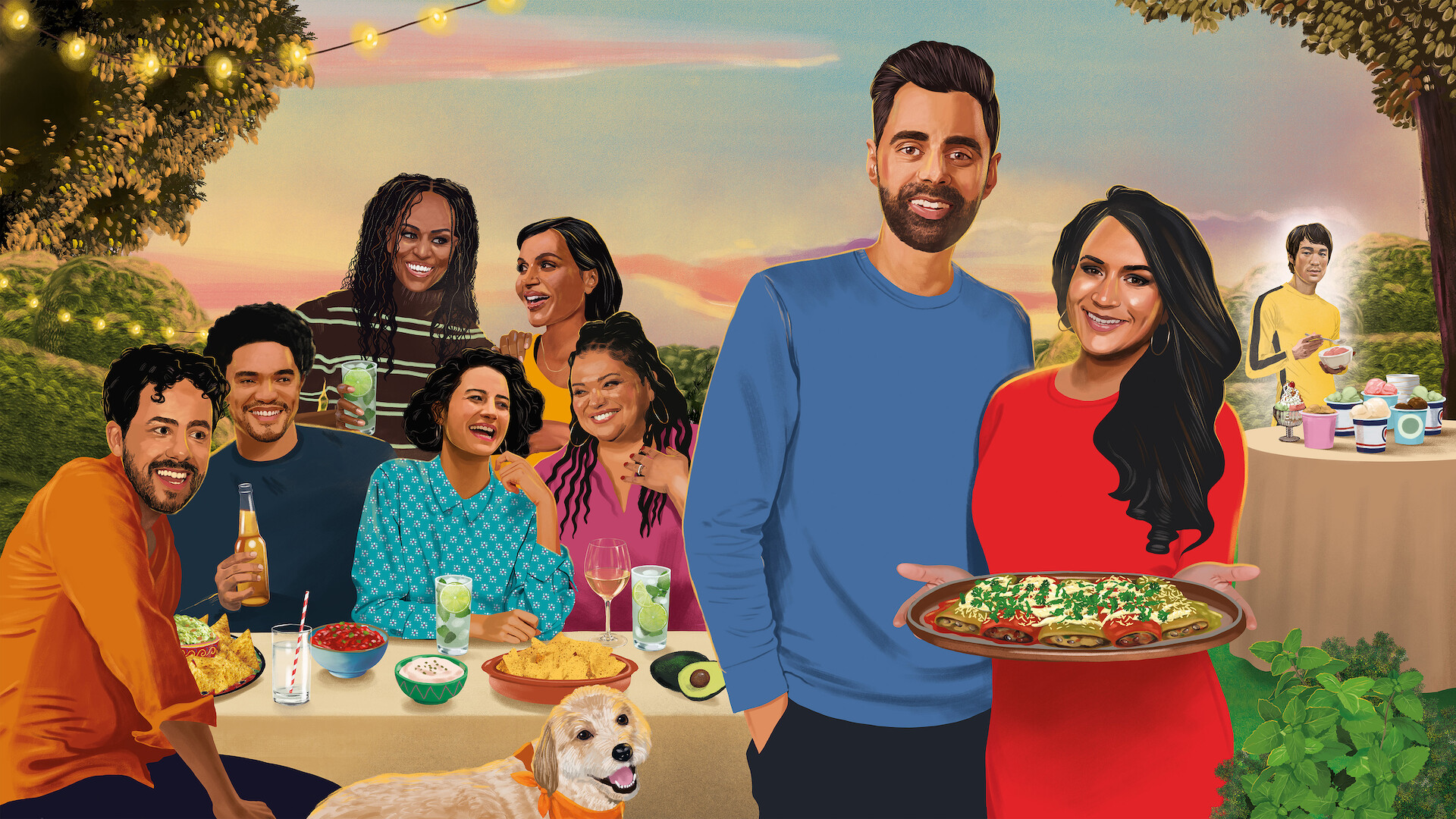 A group of people enjoying an outdoor dinner party with drinks and food, set in a garden with string lights. A couple stands in the front holding a large dish, while a dog sits beside them and more food is on a table in the background.