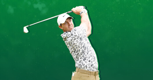 Rory McIlroy swings his club.