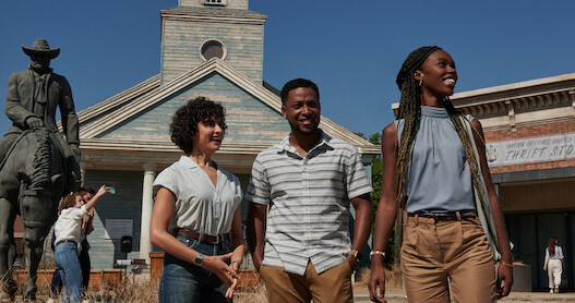 A few main characters explore the abandoned town in the Texas Chainsaw Massacre film