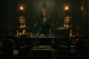 Sofia Vergara as Griselda behind a desk