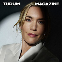 Kate Winslet with a spotlight on her face.