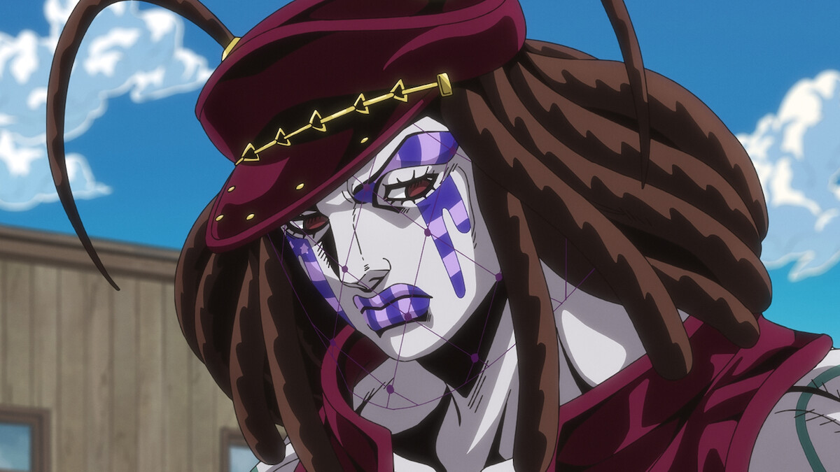 Anime character with white skin, purple facial markings, and brown dreadlocks, wearing a red hat and clothing, is outdoors in front of a wooden building under a blue sky with clouds.