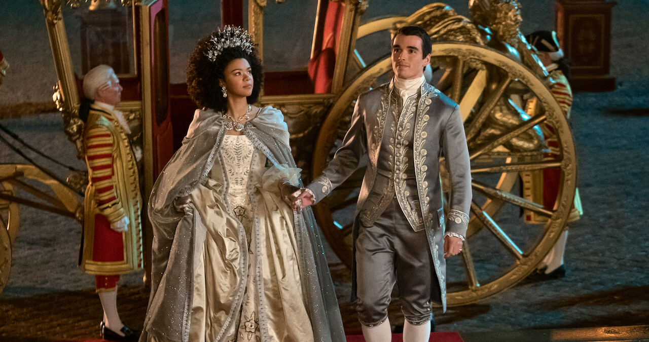 India Amarteifio's Queen Charlotte and Corey Mylchreest as King George in Queen Charlotte Season 1