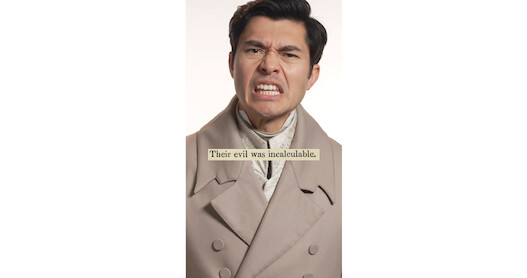 Man speaking with captions of what he's saying appearing on screen