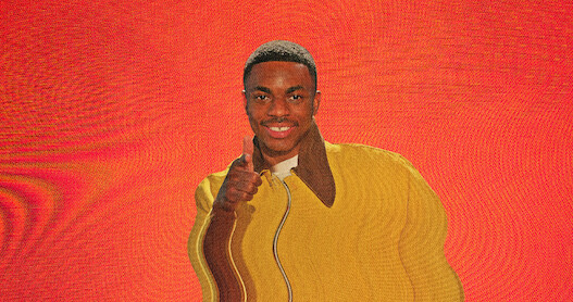 Vince Staples smiles with a screen distortion over the image