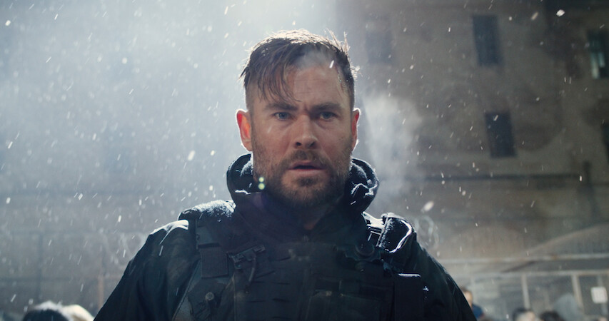 Chris Hemsworth stands alone in a still from 'Extraction 2.'