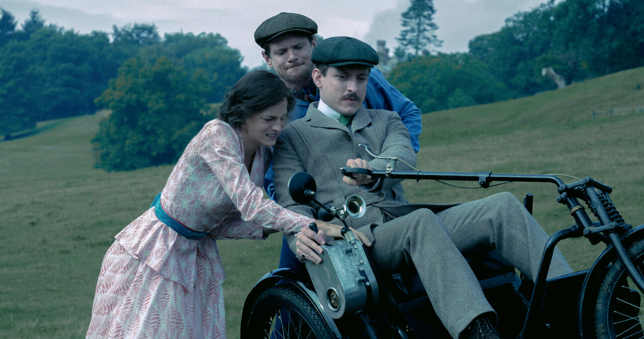 People helping out someone in a bike